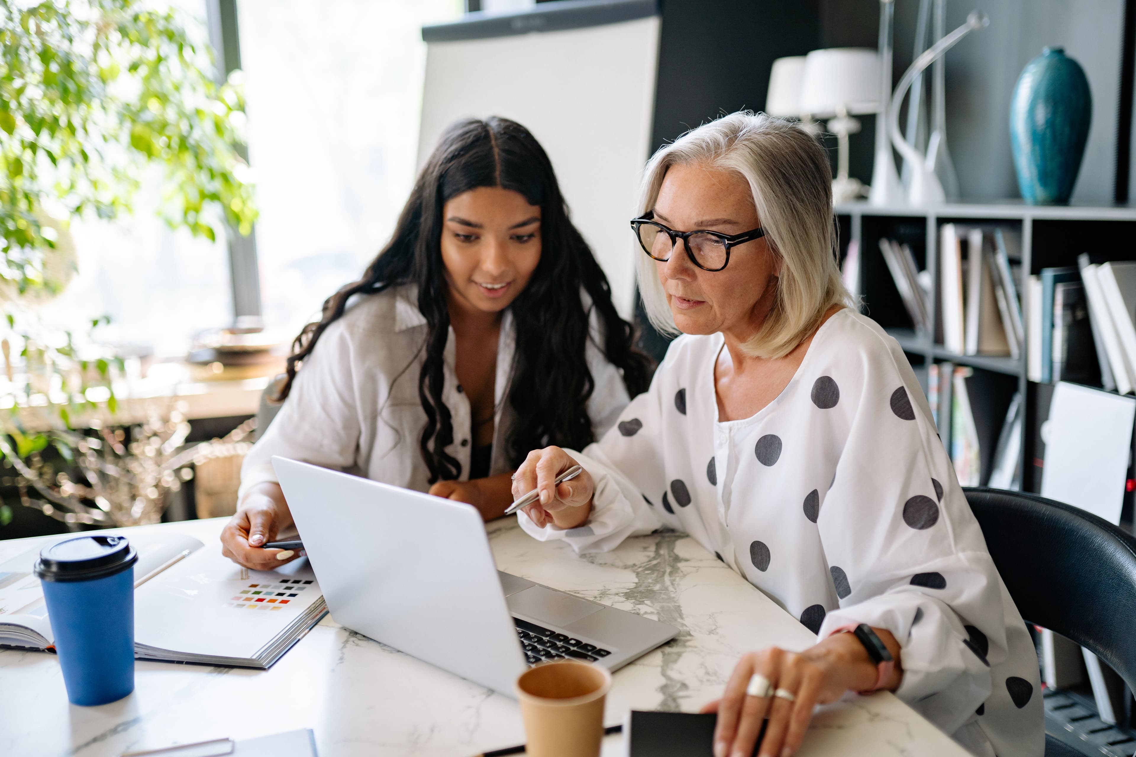 Two women collaborating